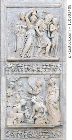 Escape of Loth by Niccolo Tribolo up and Birth of Esau and Jacob by Alfonso Lombardi down, left door of San Petronio Basilica in Bologna, Italy Escape of Loth by Niccolo Tribolo up and Birth of Esau and Jacob by Alfonso Lombardi down, left door of San Petronio Basilica in Bologna, Italy 110903409