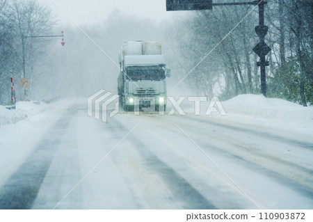 Snowy road Hokkaido 110903872