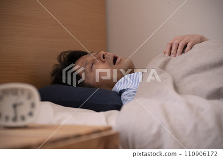 Snoring male 110906172