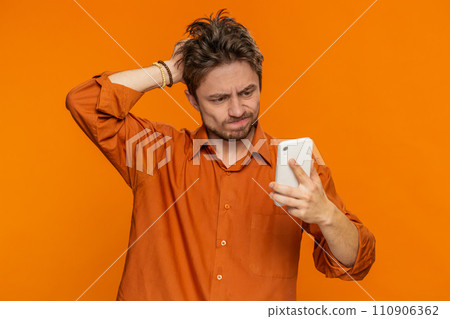 Upset sad man use smartphone play game, loses, loss fail unlucky news, bad lottery results, crisis Upset sad man use smartphone play game, loses, loss fail unlucky news, bad lottery results, crisis 110906362
