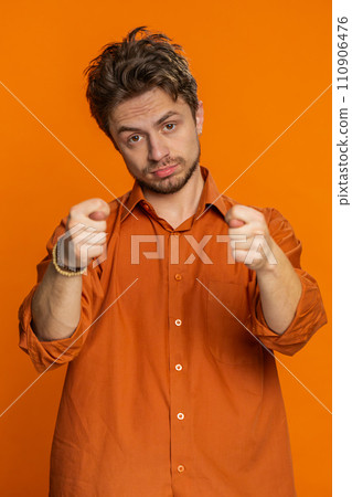 Greedy avaricious man showing fig negative gesture rapacious avaricious acquisitive refusal fig sign 110906476