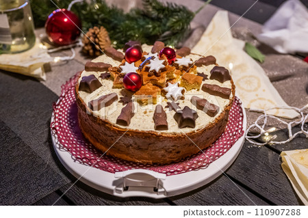 Table with beautiful and delicious christmas holiday cake at XMAS Dinner Buffet 110907288