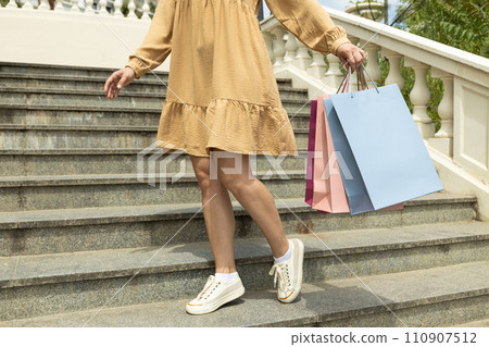 Shopping bags, on the street, on the background of steps. 110907512