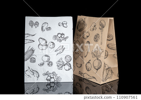 Recyclable craft paper bag for purchases, gifts and takeaway food mock up on black background. Environmentally friendly than single-use plastic bags Recyclable craft paper bag for purchases, gifts and takeaway food mock up on black background. Environmentally friendly than single-use plastic bags 110907561