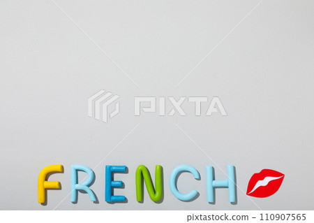 The word French on a gray background. 110907565