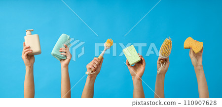 Hygiene products in the hands of women, on a bright background. 110907628