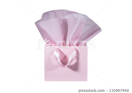 Craft paper gift bag with tissue paper isolated on a white background Craft paper gift bag with tissue paper isolated on a white background 110907948