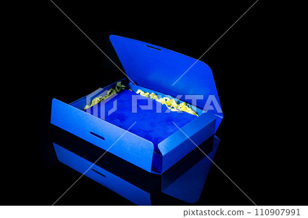 Best gift for men. Man gift concept. Blue open gift box on black background. Copy space for your text. Valentine's day, wedding, birthday and special occasion gift concept. Copy space for text. Best gift for men. Man gift concept. Blue open gift box on black background. Copy space for your text. Valentine's day, wedding, birthday and special occasion gift concept. Copy space for text. 110907991