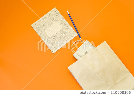 Top view brown paper shopping bag on colourful background, Mock-up of blank brown paper shopping bag and copy space. Flat lay. Top view brown paper shopping bag on colourful background, Mock-up of blank brown paper shopping bag and copy space. Flat lay. 110908306
