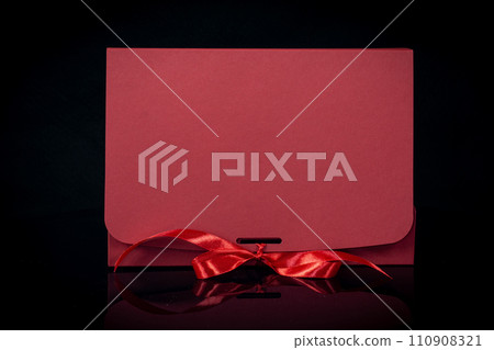 Man gift concept. gift box with luxury bow on dark background. Horizontal with copy space. 110908321
