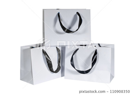 Recyclable craft paper bag for purchases, gifts and takeaway food mock up on white background. Environmentally friendly than single-use plastic bags Recyclable craft paper bag for purchases, gifts and takeaway food mock up on white background. Environmentally friendly than single-use plastic bags 110908350