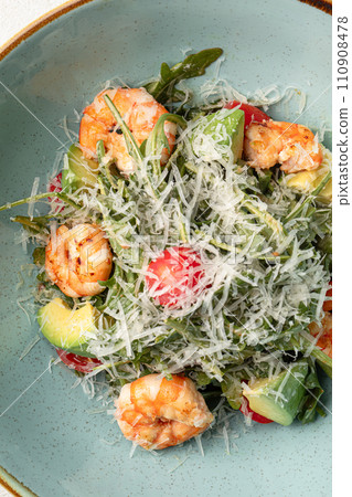 Portion of caesar salad with shrimp 110908478