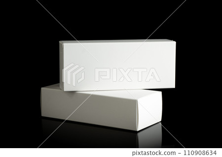 Package box rectangle, blank advertise template for products packaging. White color empty closed cardboard container against black background 110908634