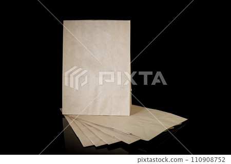 Set of paper bags for shopping on black background. Mockup for design 110908752