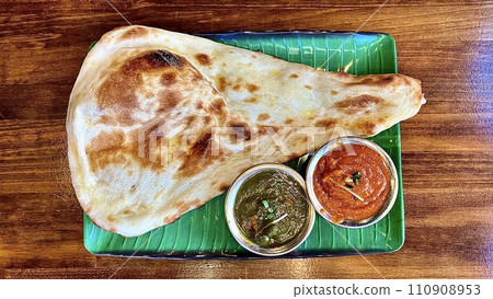 Set of Indian Nepalese naan, shrimp spinach curry and mutton de piazza curry Set of Indian Nepalese naan, shrimp spinach curry and mutton de piazza curry 110908953