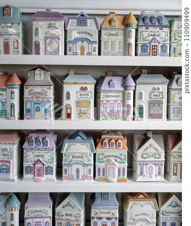 Grandmothers vintage kitchen spices shelf tools for cooking in old house formed porcelain containers 110909499