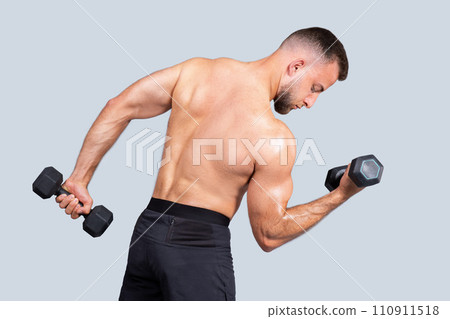 Serious sweat strong muscular young european man athlete with beard, naked torso 110911518