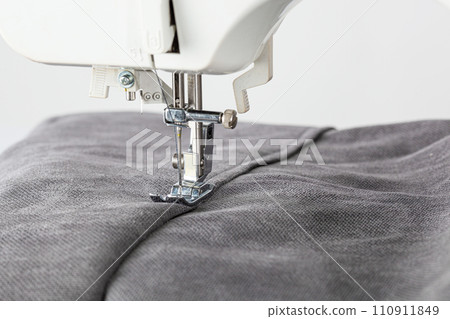 Sewing machine, stitching fabrics, needle in a round plan 110911849