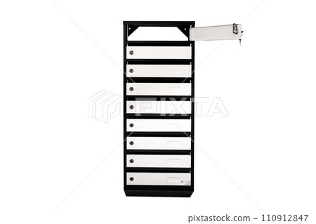 Mail boxes filled of leaflets and letters. Shallow DOF,Mailboxes and Lock in Rows at Entrance 110912847