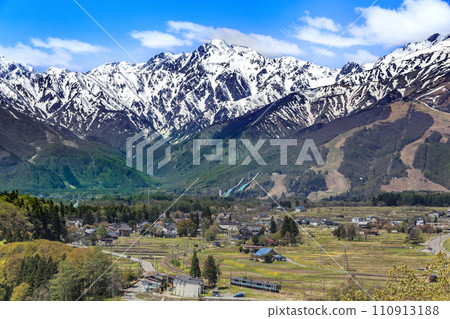 majestic mountains with lingering snow 110913188