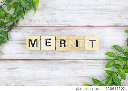 White wood background with letters of merit 110913502