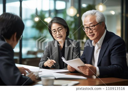 Japanese old man reading documents Japanese old man reading documents 110913516