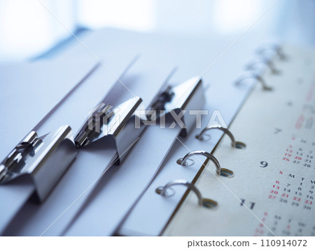 Documents, calendar, and notebook placed on the table Documents, calendar, and notebook placed on the table 110914072
