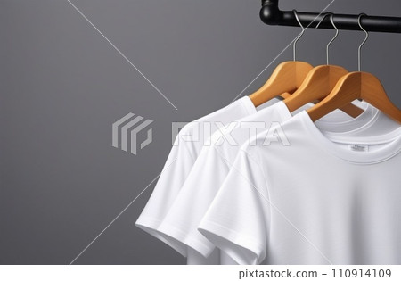 Simple white t-shirts mockup on a gray background 110914109
