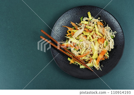 Vegan salad with enoki mushrooms. Vegan salad with enoki mushrooms. 110914193