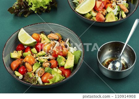 Homemade seafood salad with fish mussels, octopus. Homemade seafood salad with fish mussels, octopus. 110914908
