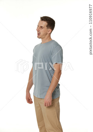 portrait of young happy man winking looking at the camera on white background portrait of young happy man winking looking at the camera on white background 110916977