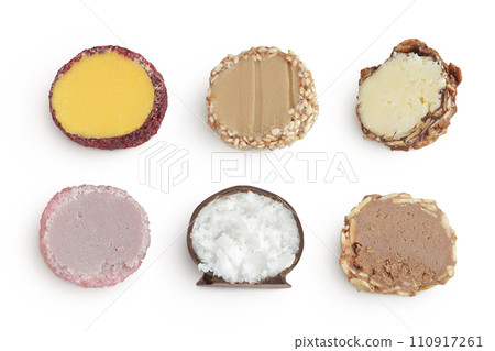 A variety of different truffles Isolated on a white background. Top view. Flat lay A variety of different truffles Isolated on a white background. Top view. Flat lay 110917261