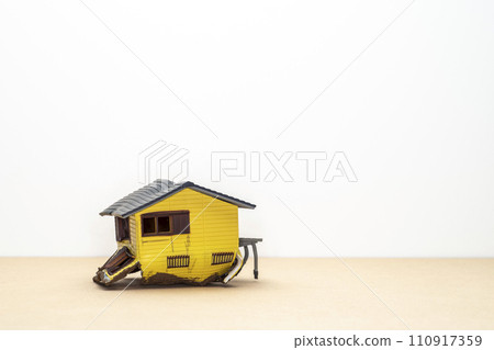 Wooden house collapsed by earthquake Wooden house collapsed by earthquake 110917359