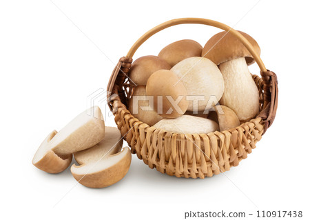 Fresh porcini cep mushroom in wicker basket isolated on white background with full depth of field 110917438