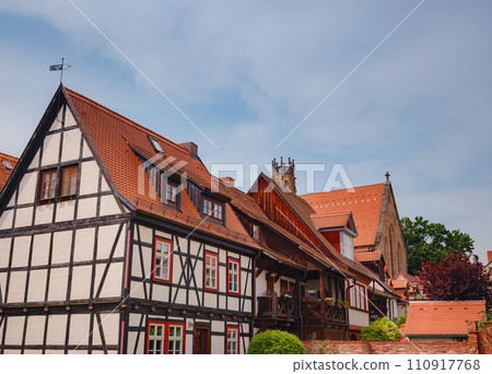 spring trip to Europe. Travel and German sightseeing locations. scenic view to facade of old historic houses somewhere in Erfurt city, Traditional half-timbered houses makes cozy and fairy tail mood 110917768