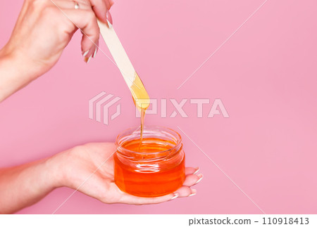 Natural honey sugar paste for shugaring. Depilation and beauty concept 110918413