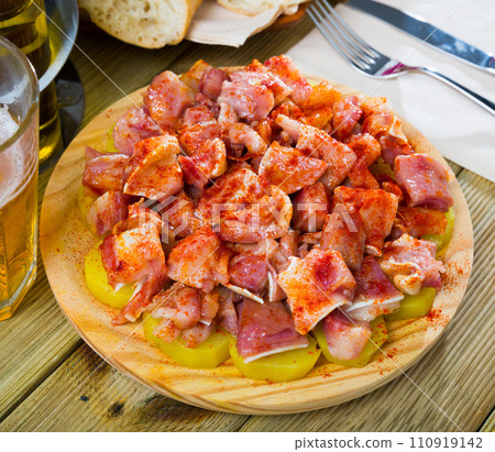 Orejas a la gallega - spanish dish. Roast pigs ears with spice Orejas a la gallega - spanish dish. Roast pigs ears with spice 110919142