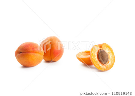 Apricot fruit whole and half isolated on white background.. 110919148