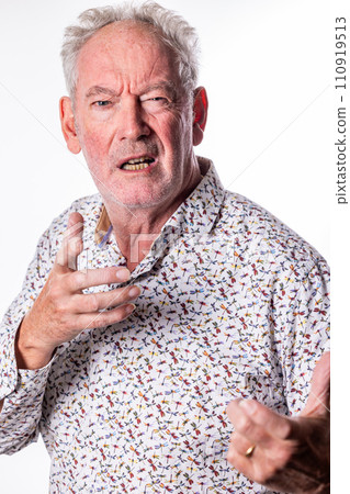 Expressive Elderly Man in Conversation 110919513