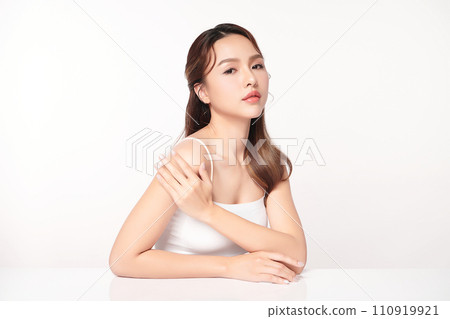 Beautiful young asian woman with clean fresh skin on white background, Face care, Facial treatment, Cosmetology, beauty and spa, Asian women portrait. Beautiful young asian woman with clean fresh skin on white background, Face care, Facial treatment, Cosmetology, beauty and spa, Asian women portrait. 110919921