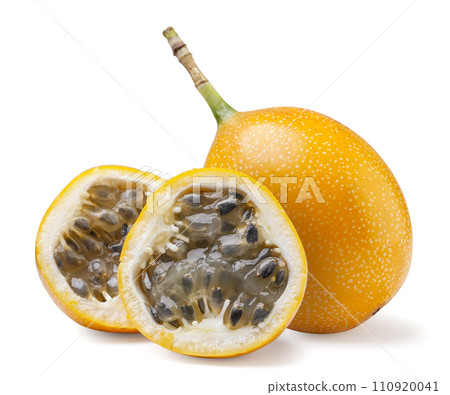 Granadilla and two halves close-up on a white background. Granadilla and two halves close-up on a white background. 110920041