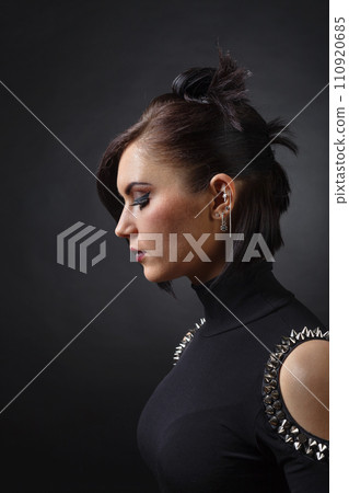Woman punk in black. 110920685