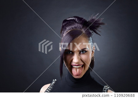 Beautiful woman punk on black background. 110920688