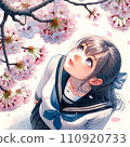 Girl looking up at the cherry blossoms 110920733
