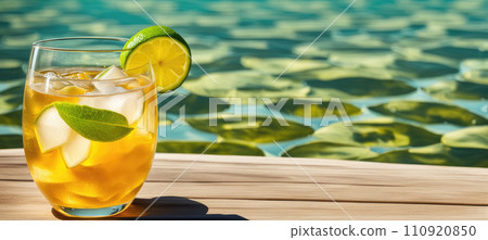 Refreshing Summer Drink by the Pool 110920850