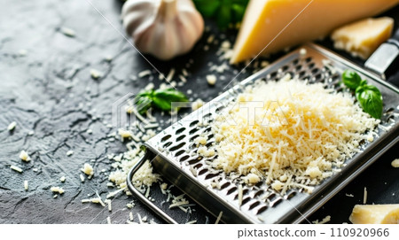 AI-generated content. Shredded mozzarella cheese on wooden cutting board. 110920966