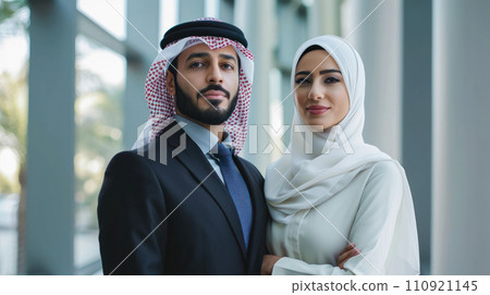 AI-generated content. lovely Arabic Couple portrait in office 110921145