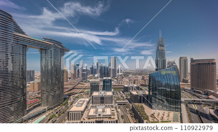 Futuristic Dubai Downtown and financial district skyline aerial all day timelapse. Futuristic Dubai Downtown and financial district skyline aerial all day timelapse. 110922979