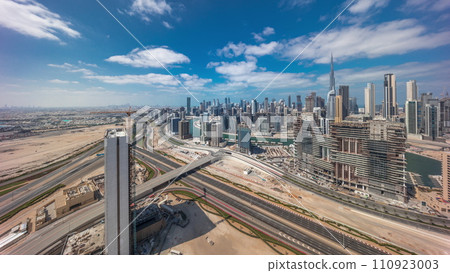 Panoramic skyline of Dubai with business bay and downtown district morning timelapse. 110923003