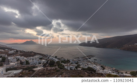 Panorama showing sunset on Amorgos island aerial timelapse from above. Greece Panorama showing sunset on Amorgos island aerial timelapse from above. Greece 110923041